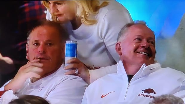 Razorbacks Sam Pittman with Bobby Petrino at basketball game with Duke